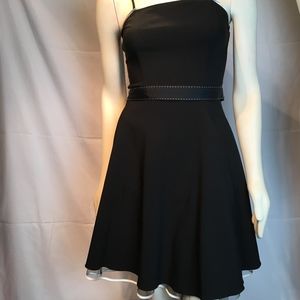 cute little black dress with flirty hem